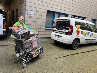 Einkaufswagen und Frau Vaupel